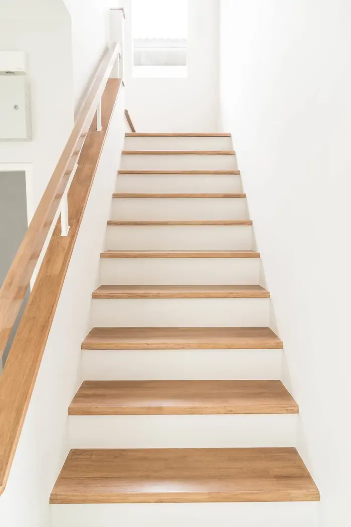 Custom wood handrail in a Cabo residence