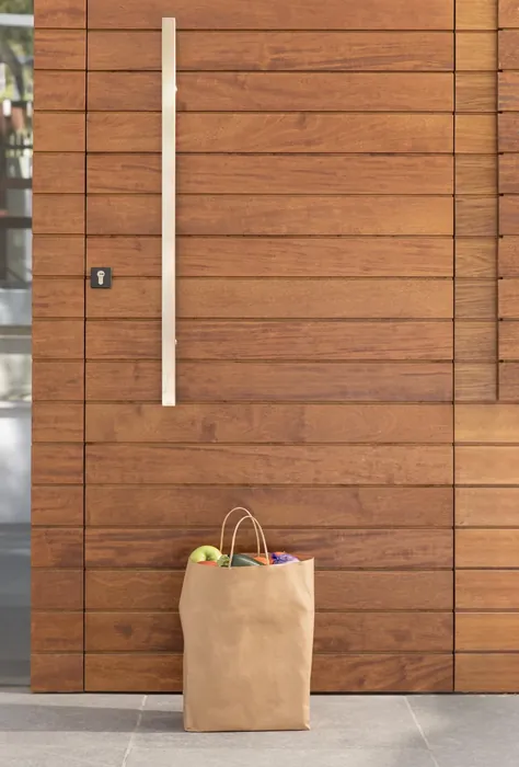 Custom walk-in closet with premium wood shelving by Cabo carpenter