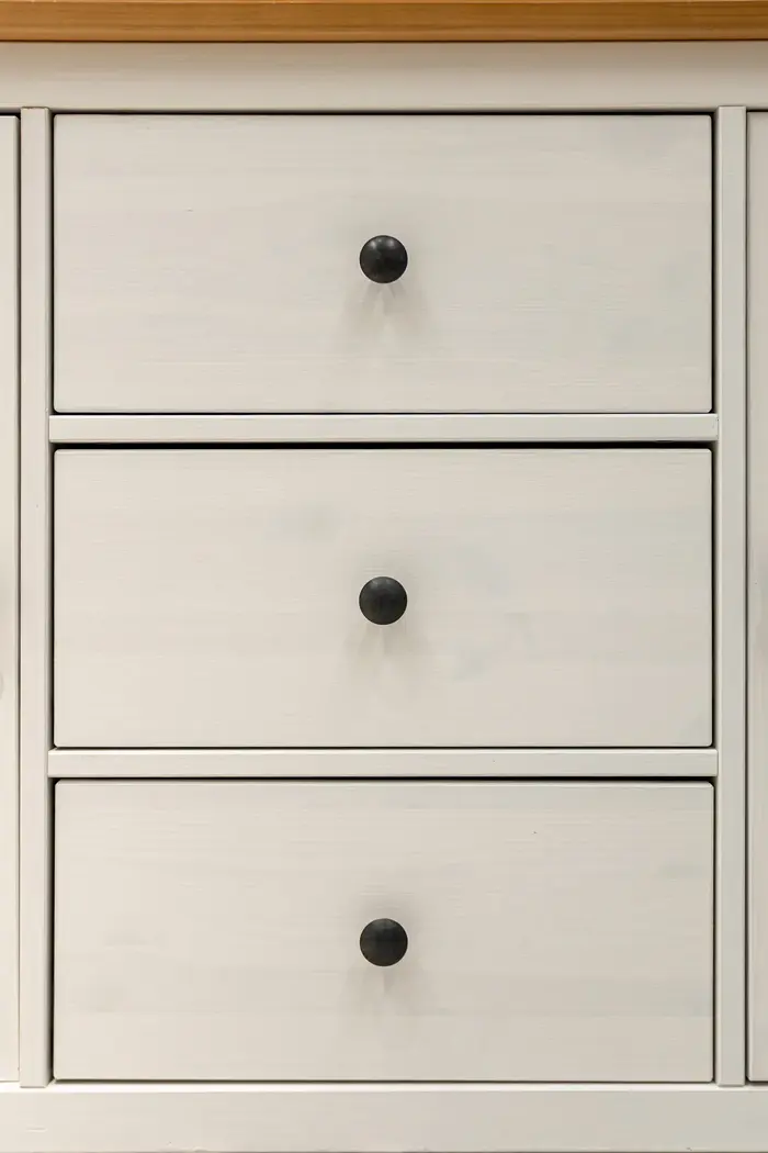 Kitchen drawers with black hardware in a Cabo villa