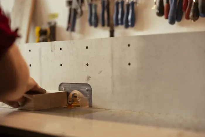 Carpenter working wood in the Cabo workshop