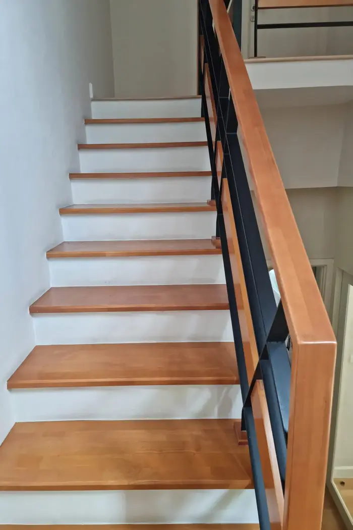 Solid wood staircase inside a Cabo villa